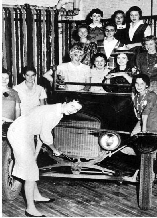 Members of Phi Mu sorority pose in Ken Swan's 1922 Model T Ford touring car